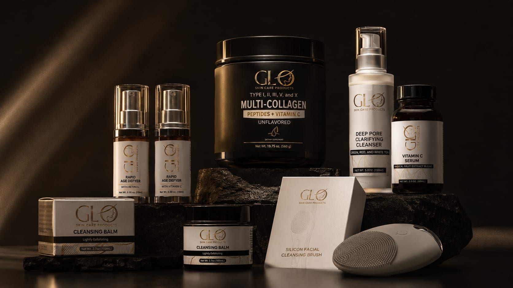 GLO Skin Care product composition with multi-collagen tub, serums, and cleansers on dark stone